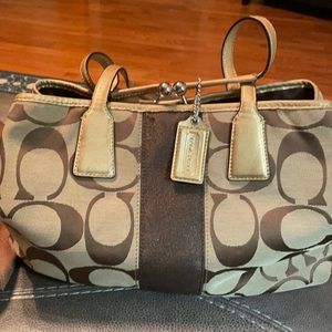 Coach monogram gold and brown.